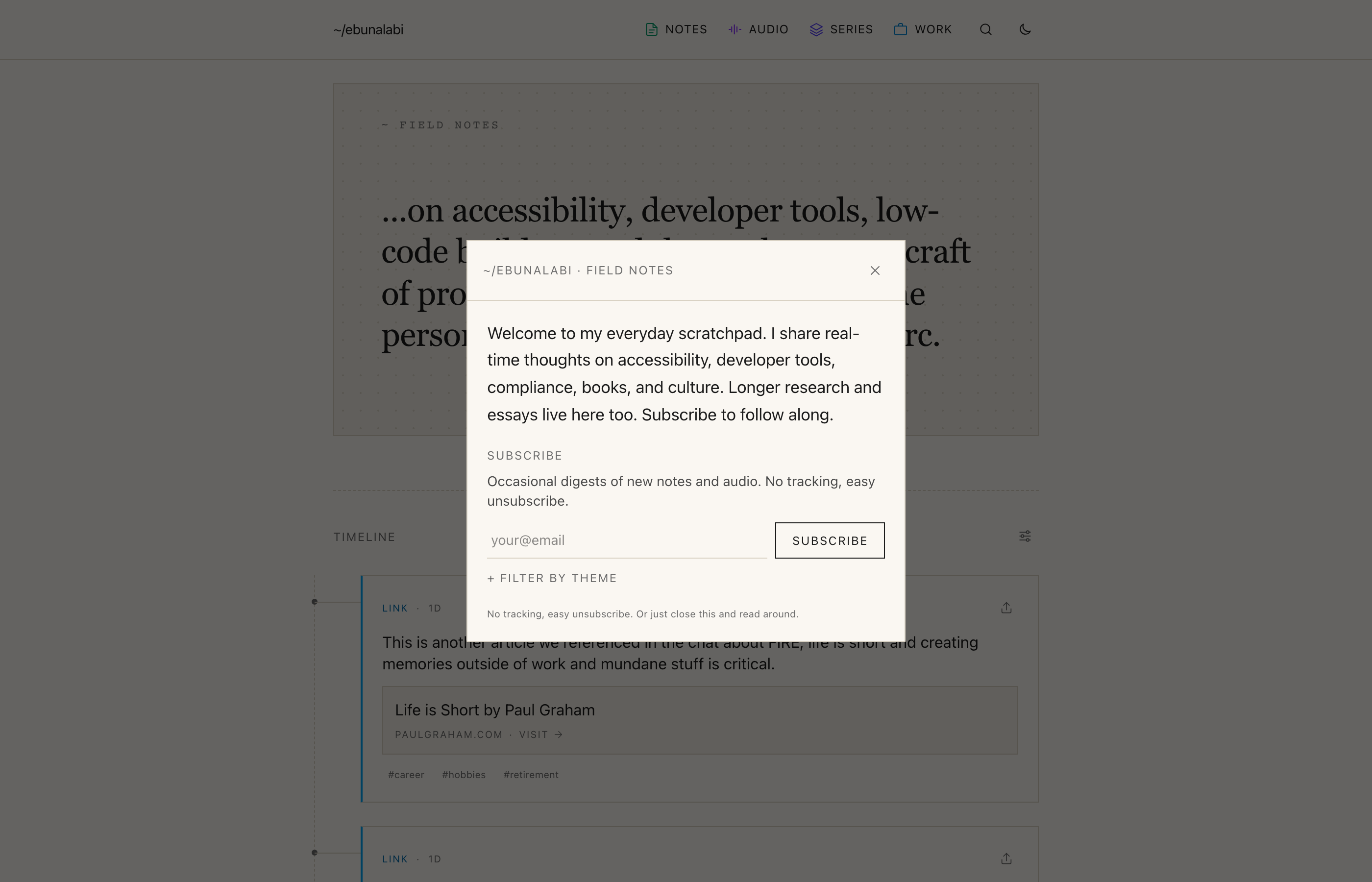 A modal card overlaid on the ebunalabi.com landing page. Inside the card: the kicker 